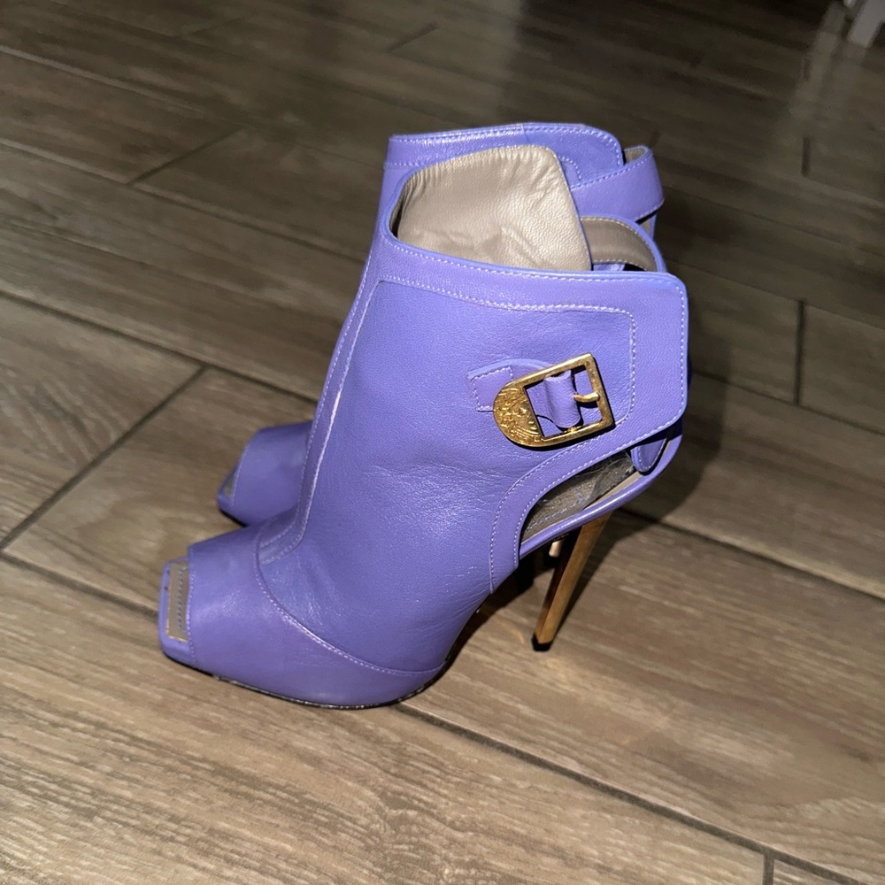 Versace Vero Cuoio open toe heels.